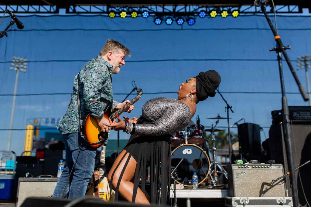 two blues musicians dancing on stage at the bradenton blues festival